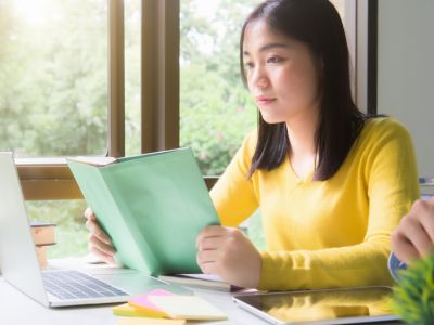 Student reading a book